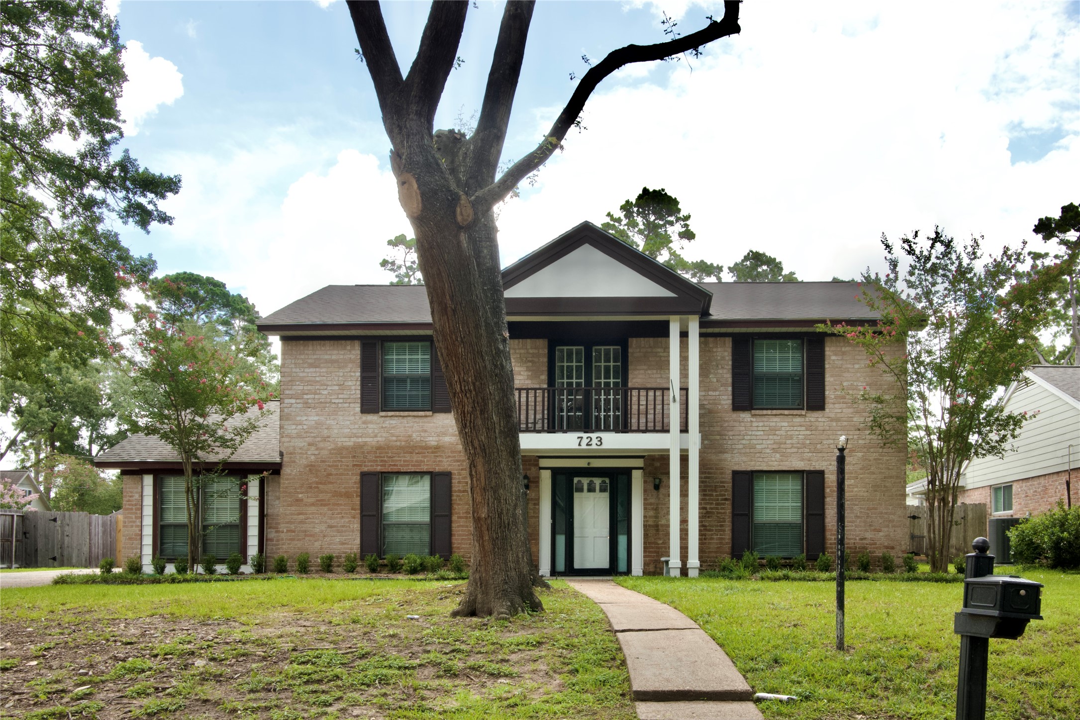 723 Leaflet Lane Spring, TX 77388 - Photo 3 of 41 a front view of a house with a yard