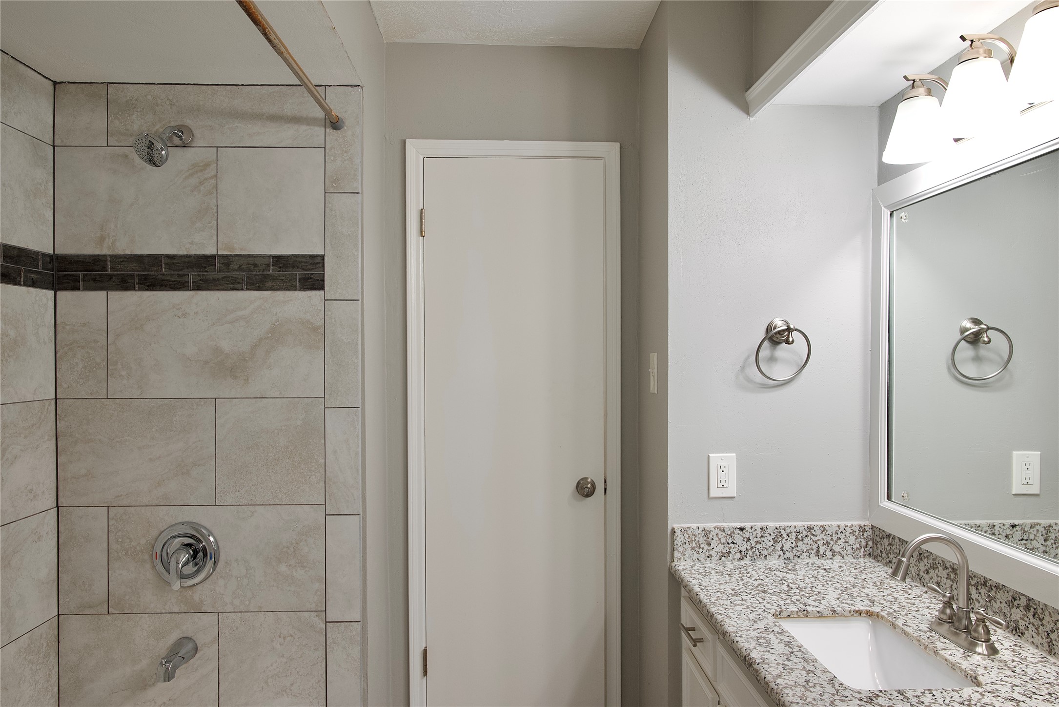 723 Leaflet Lane Spring, TX 77388 - Photo 35 of 41 a bathroom with a granite countertop sink and shower
