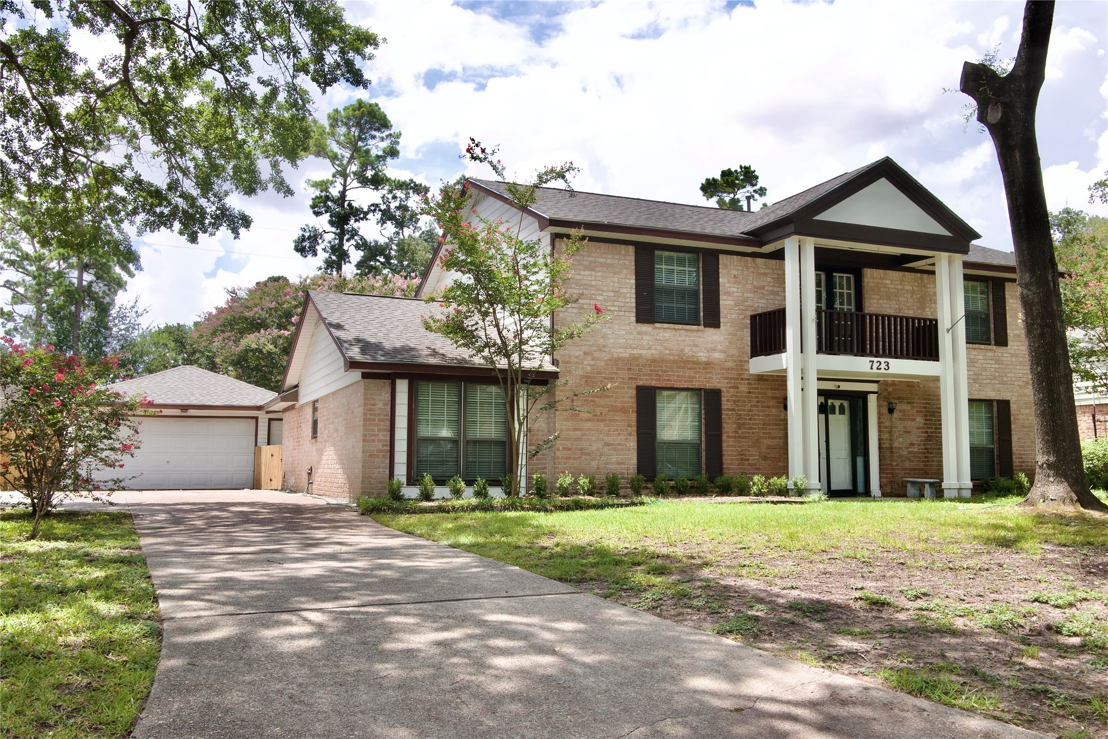 723 Leaflet Lane Spring, TX 77388 - Photo 6 of 41 a front view of a house with a garden