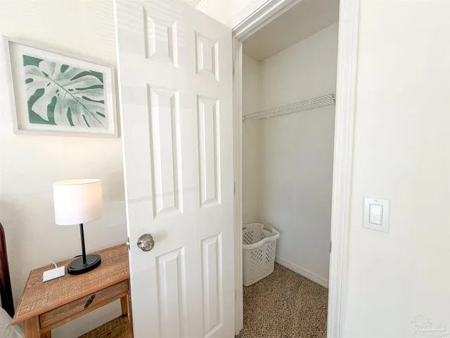 a bathroom with a toilet shower and a sink