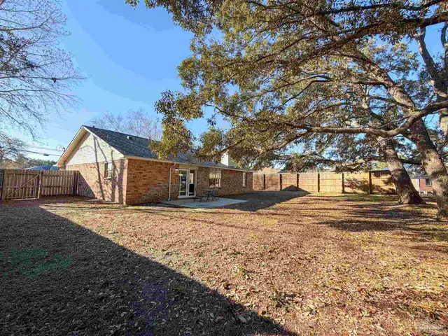 a view of yard with tree s