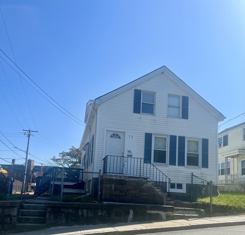 73 Brow Street Fall River, MA 02721 - Photo 2 of 9 a front view of a house with a yard