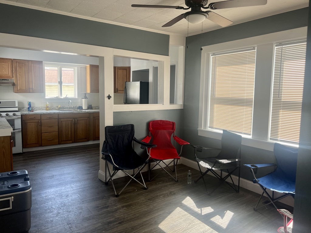 73 Brow Street Fall River, MA 02721 - Photo 3 of 9 a workspace with furniture and a window