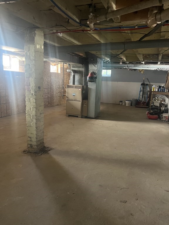 73 Brow Street Fall River, MA 02721 - Photo 9 of 9 a view of empty room with wooden floor