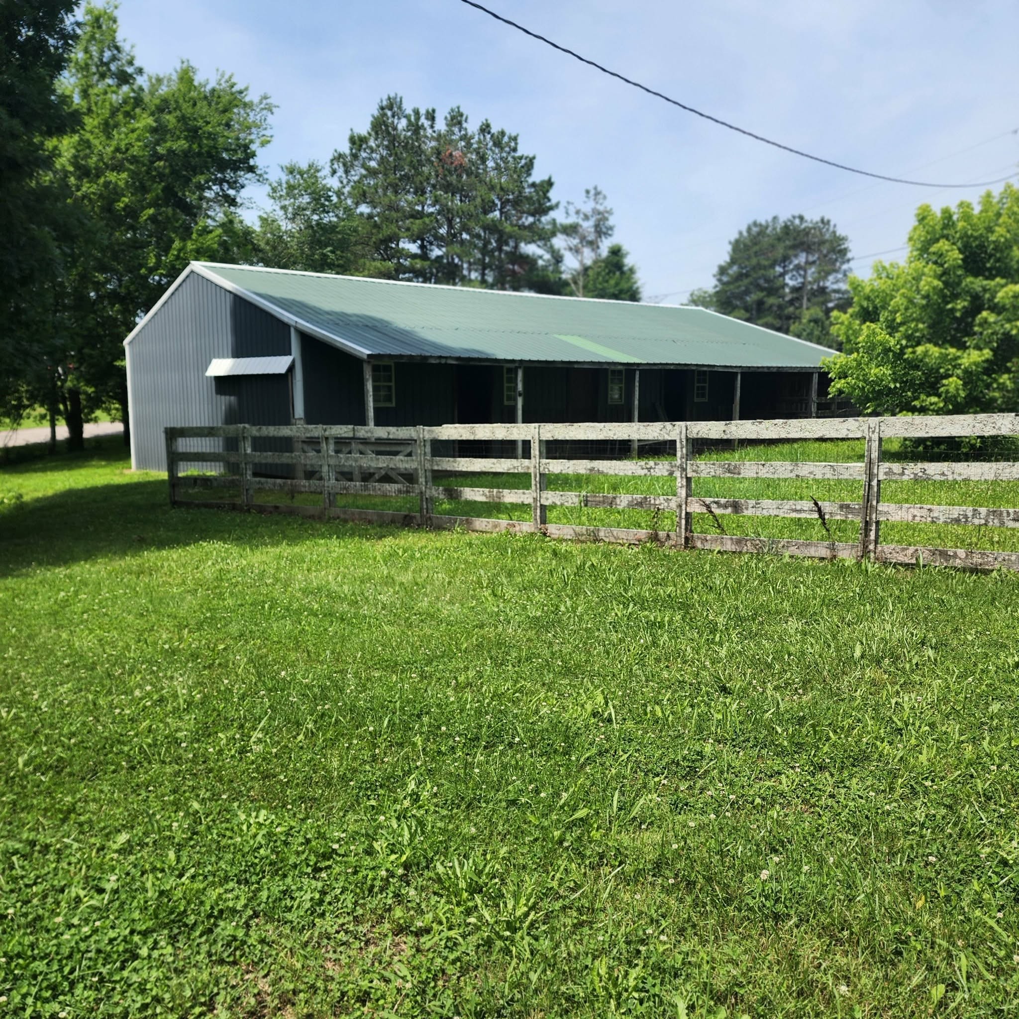 145 Mrs Gower Road Lawrenceburg, TN 38464 - Photo 26 of 26 a front view of a house with a yard
