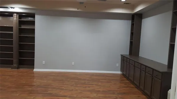 a view of an empty walk in closet
