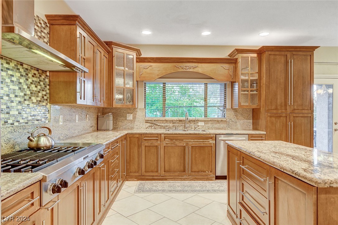 1118 Riddle Glen Street Henderson, NV 89012 - Photo 24 of 82 Gourmet Kitchen: Bright, open, and seamlessly connected to the living and dining areas—perfect for hosting and gathering.