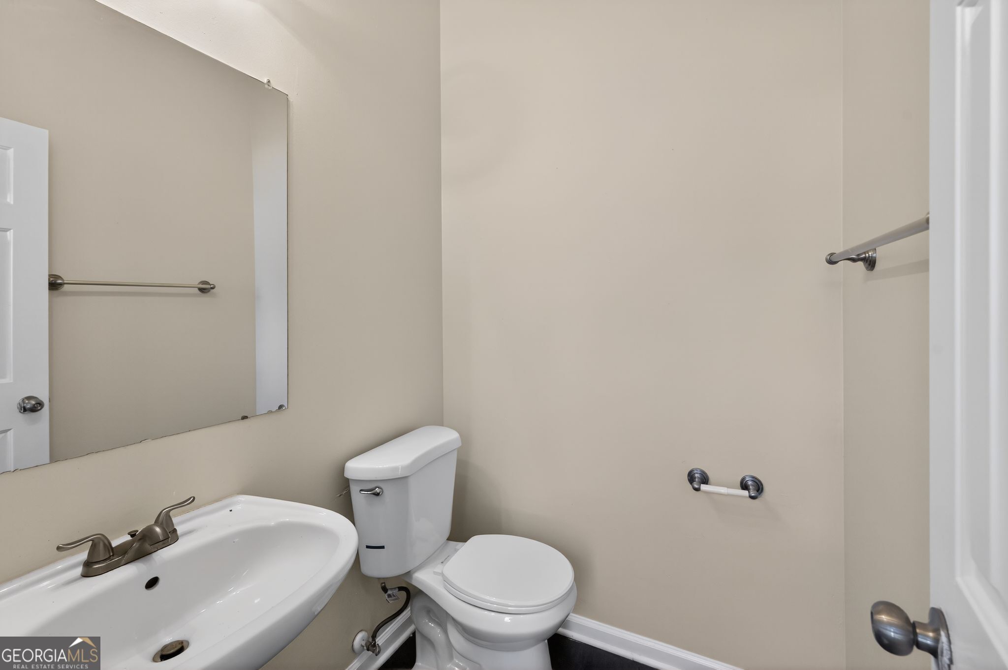 4292 Linecrest Lane Ellenwood, GA 30294 - Photo 16 of 33 a bathroom with a sink and a toilet