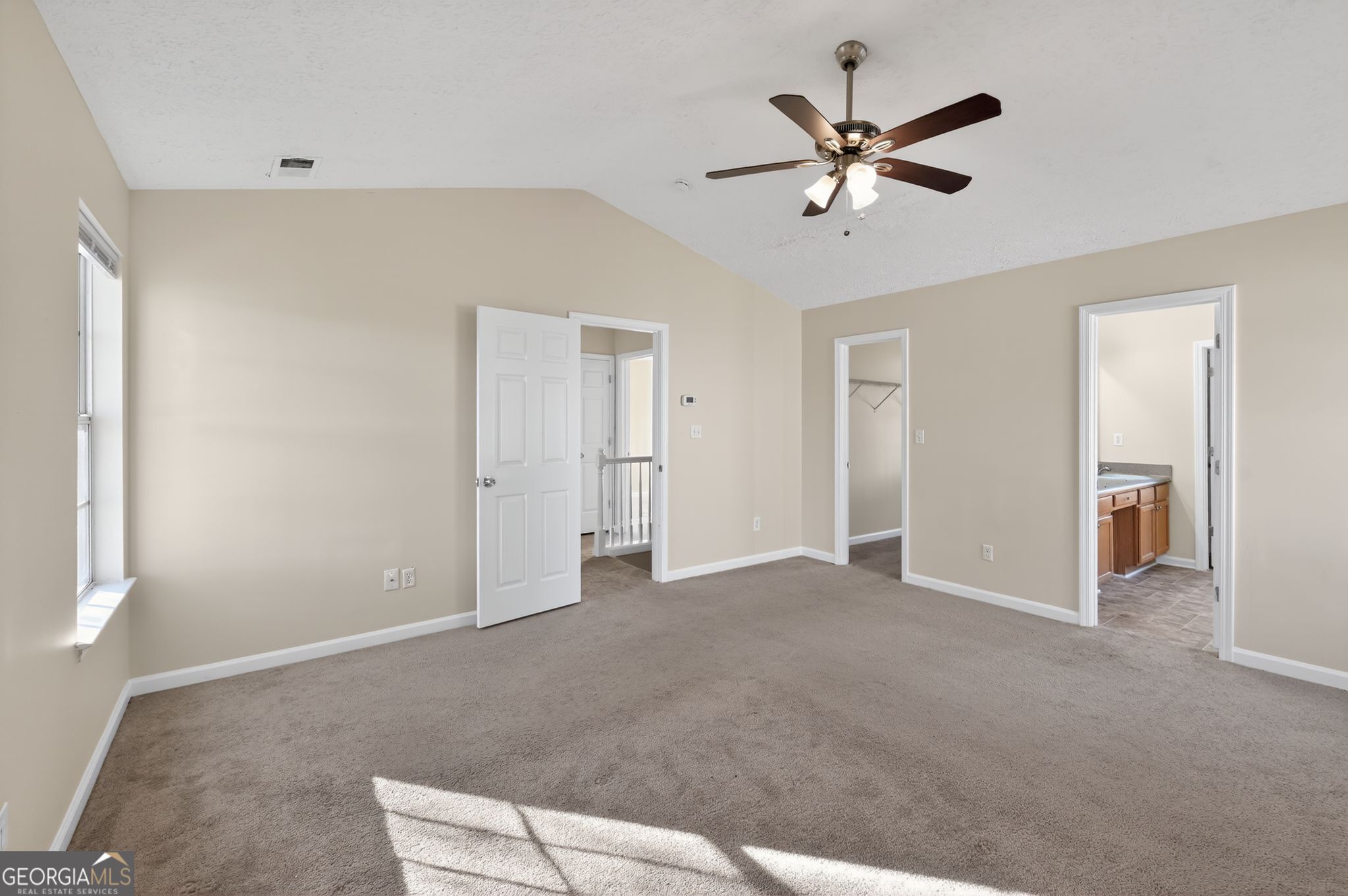 4292 Linecrest Lane Ellenwood, GA 30294 - Photo 20 of 33 a view of an empty room with a ceiling fan