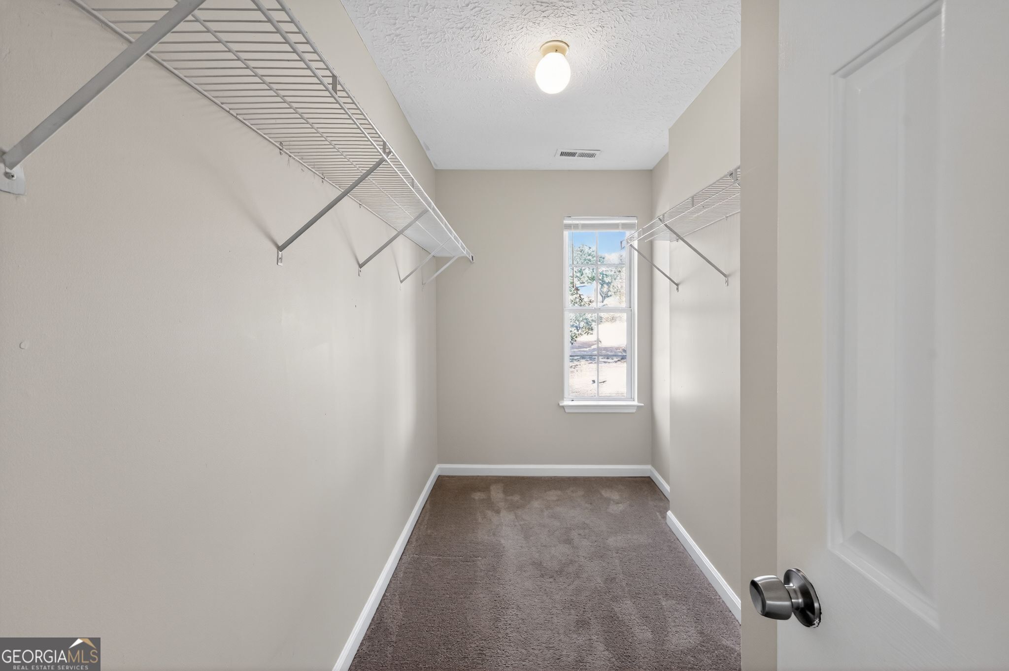 4292 Linecrest Lane Ellenwood, GA 30294 - Photo 23 of 33 an empty room with windows