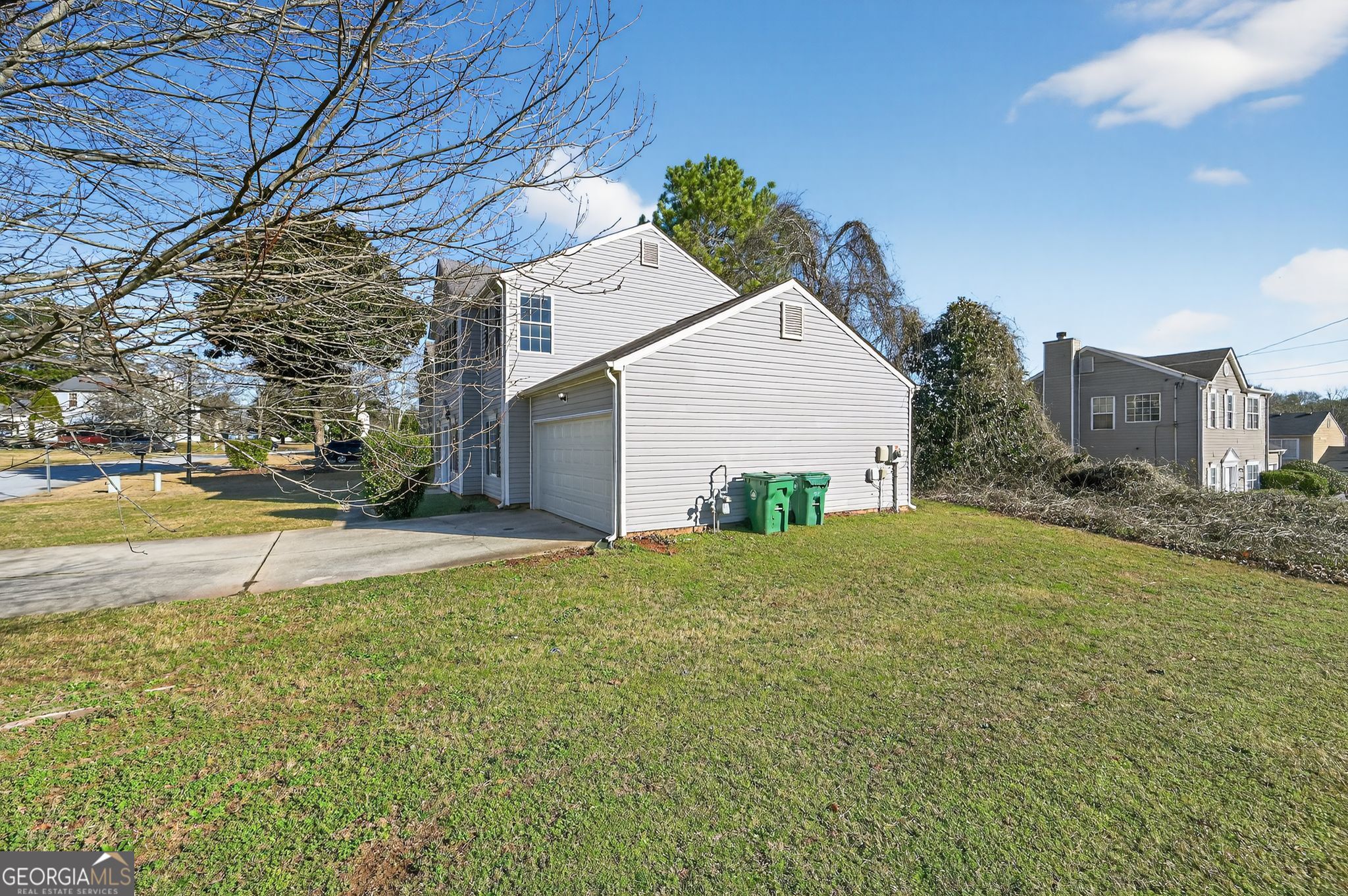 4292 Linecrest Lane Ellenwood, GA 30294 - Photo 3 of 33 a view of a house with a yard and garage