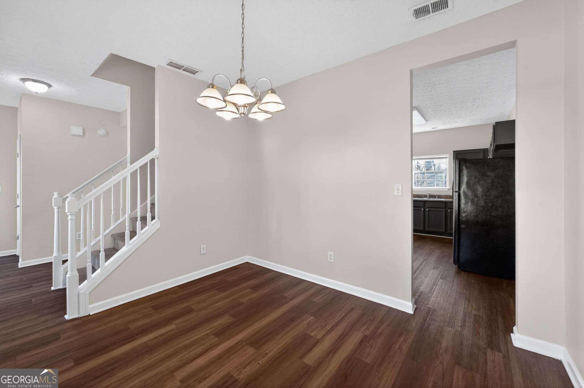4292 Linecrest Lane Ellenwood, GA 30294 - Photo 7 of 33 a view of a livingroom with wooden floor