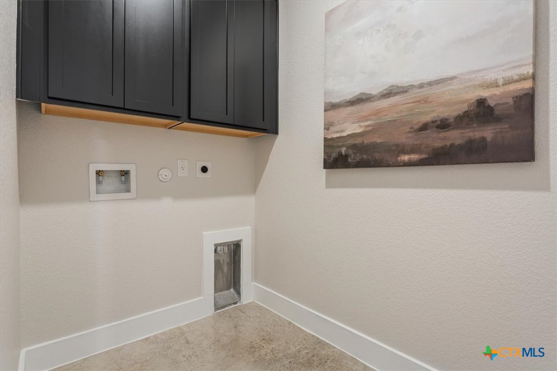 1214 Coriander Road Temple, TX 76501 - Photo 14 of 36 laundry room with plenty of cabinet storage