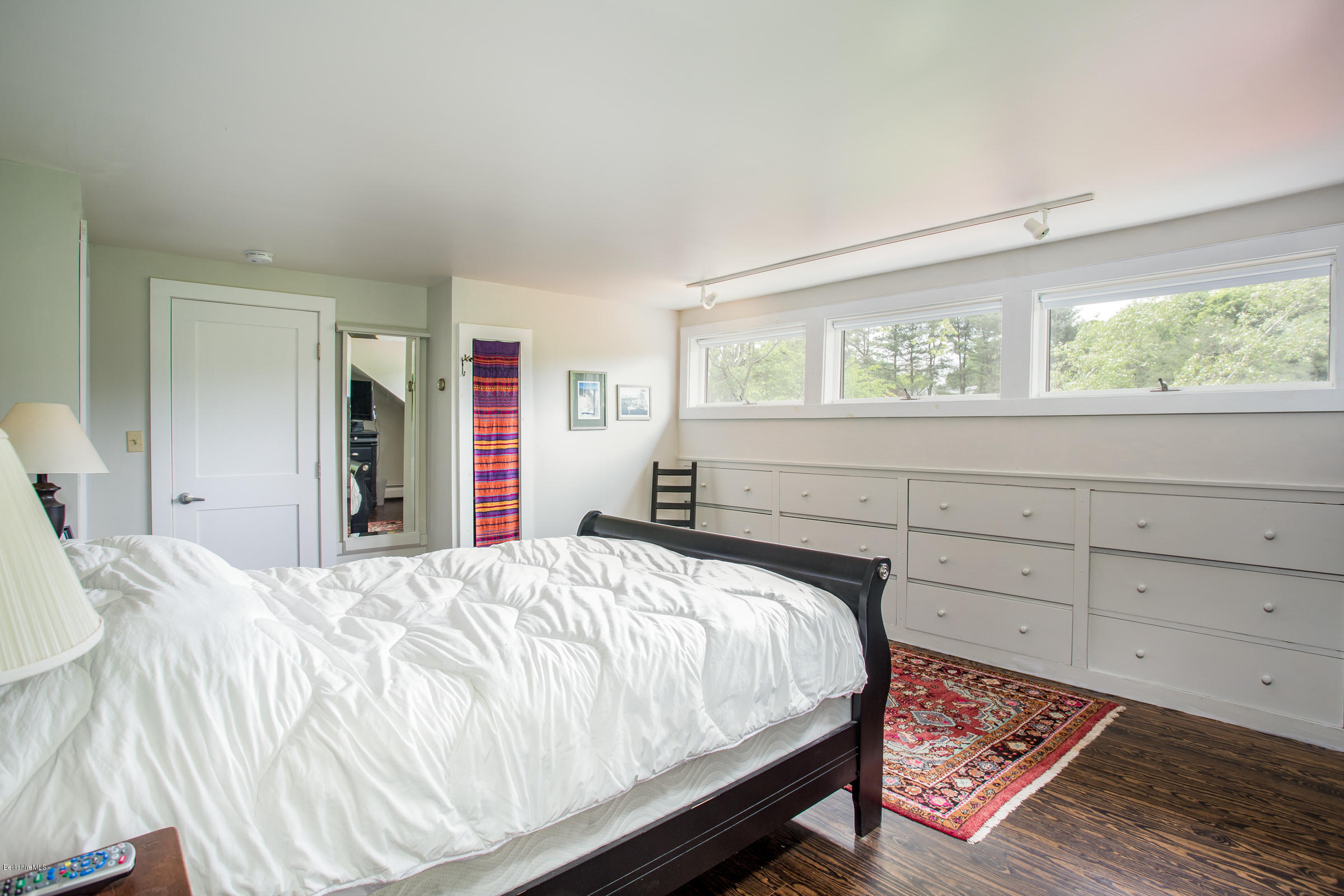 128 West Center Road West Stockbridge, MA 01266 - Photo 13 of 21 a bed sitting in a bedroom next to a window