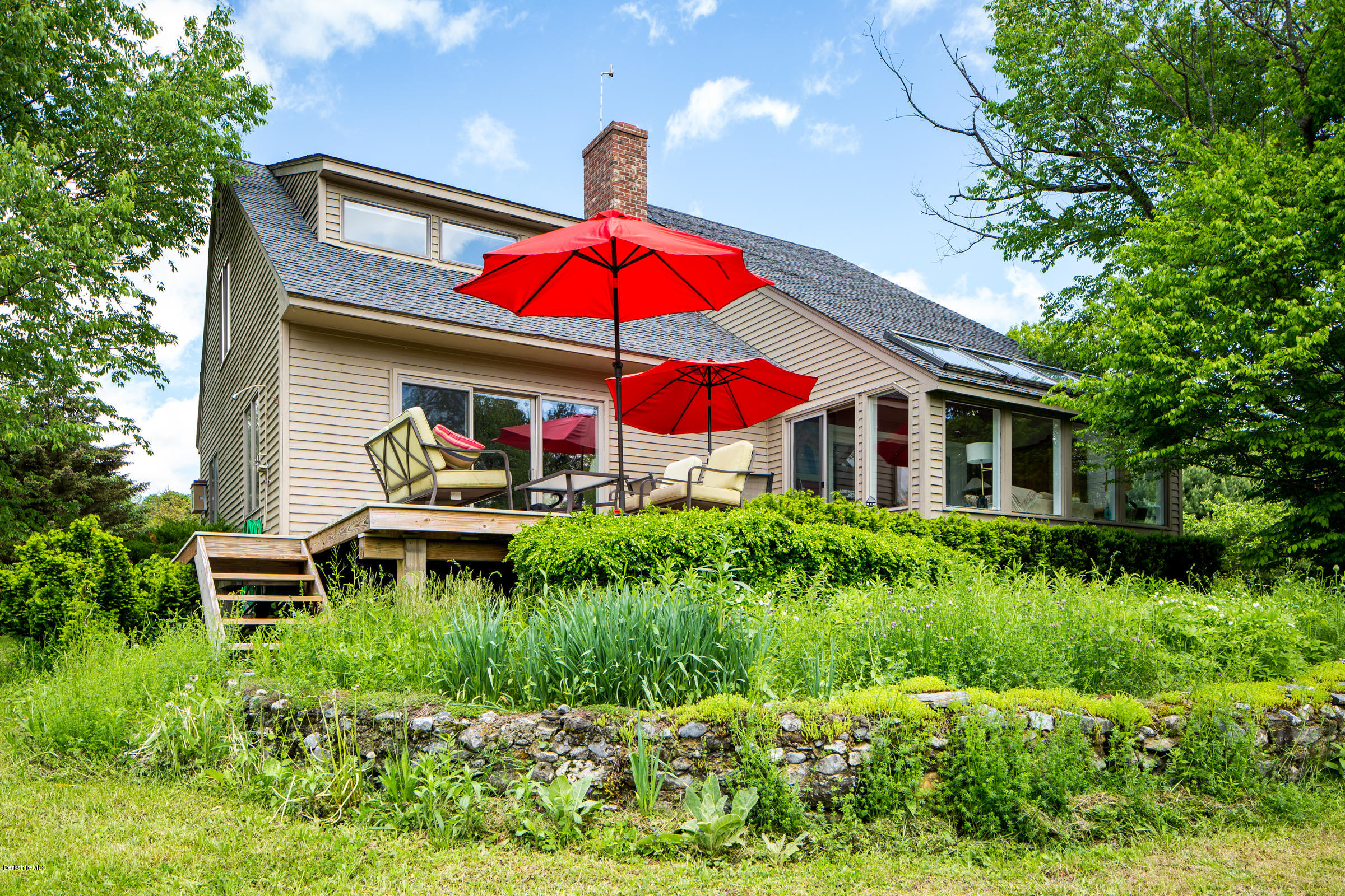128 West Center Road West Stockbridge, MA 01266 - Photo 20 of 21 a view of house with a yard and lawn chairs