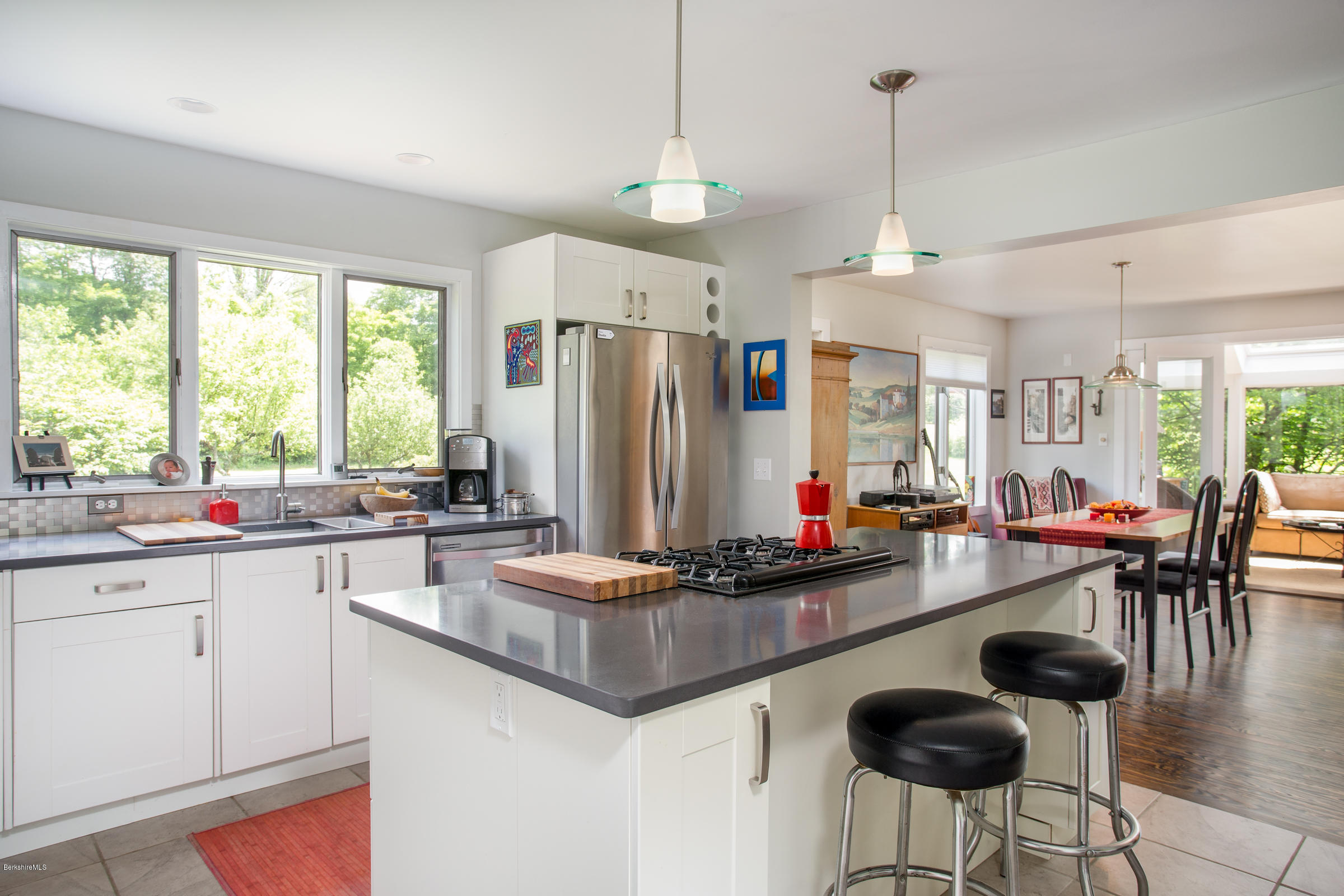 128 West Center Road West Stockbridge, MA 01266 - Photo 4 of 21 a kitchen with stainless steel appliances granite countertop a sink a stove and a wooden floors