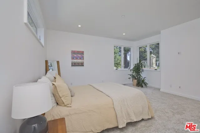 a bathroom with a double vanity sink and mirror