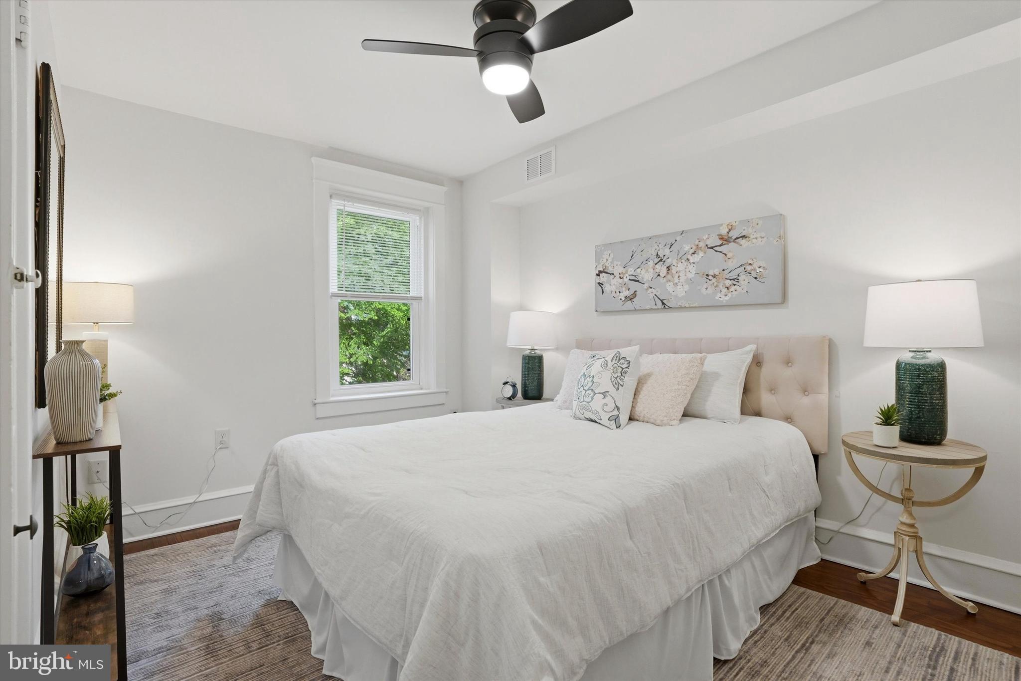18 Vernon Road Havertown, PA 19083 - Photo 15 of 25 a bedroom with a bed and wooden floor