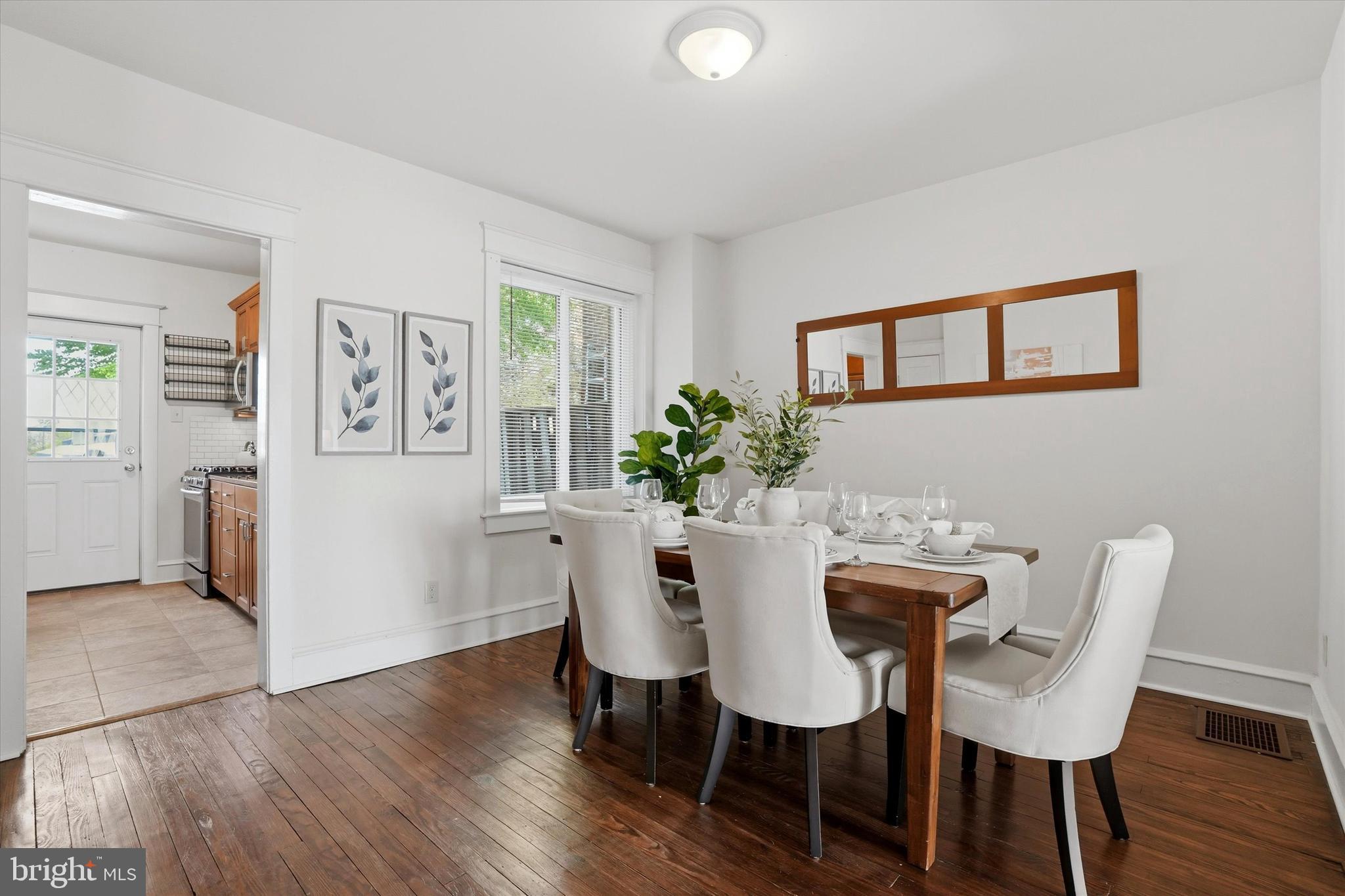 18 Vernon Road Havertown, PA 19083 - Photo 7 of 25 a view of a dining room with furniture window and wooden floor