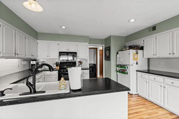 $310,000 | 9002 West 120th Terrace, Overland Park, KS 66213