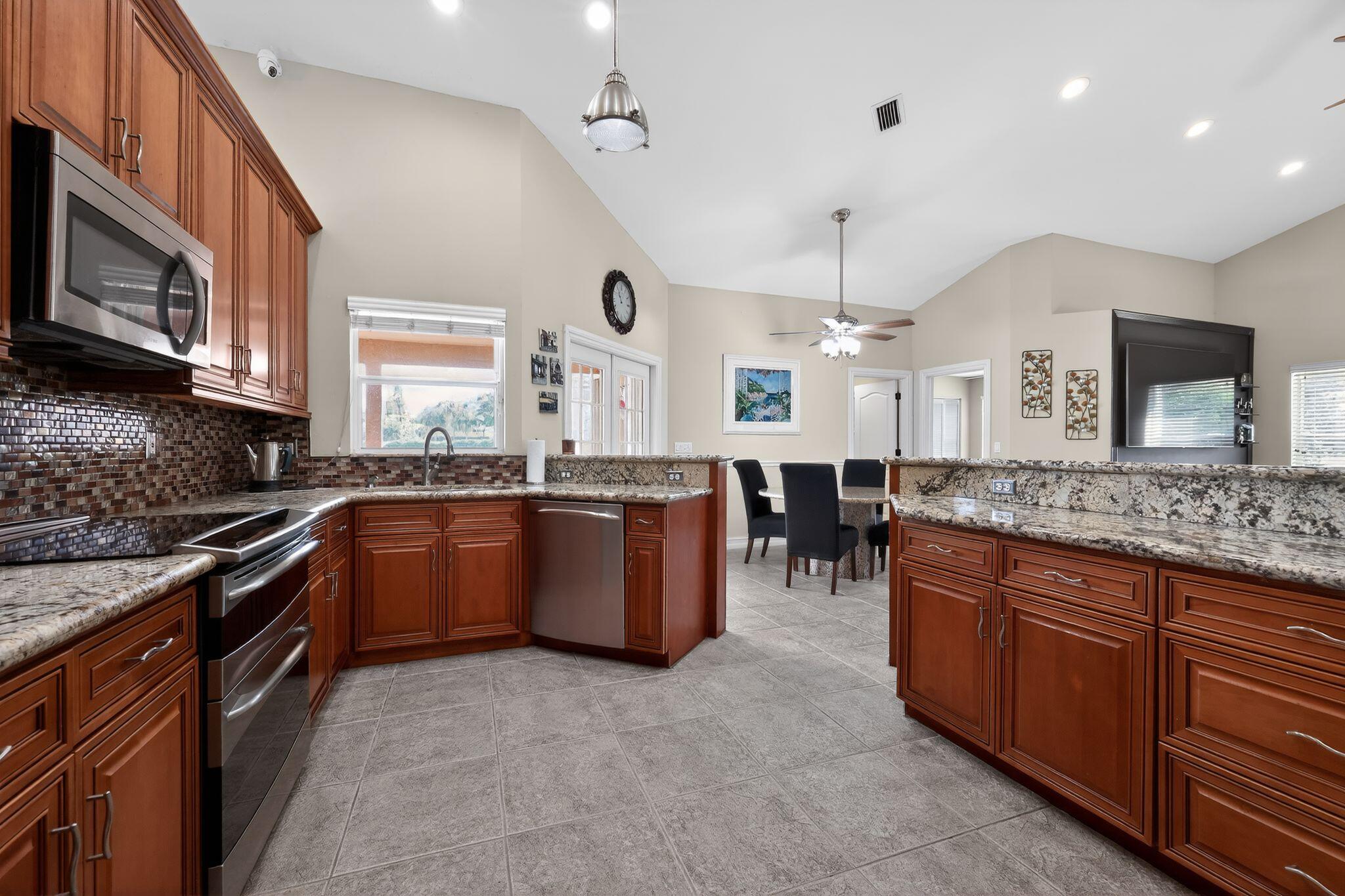 12301 Cabot Court Boca Raton, FL 33428 - Photo 11 of 30 16_12301_Cabot_Ct_Boca_Raton_FL_33428_US