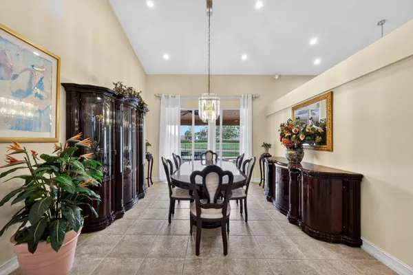 a kitchen with a refrigerator sink and stove
