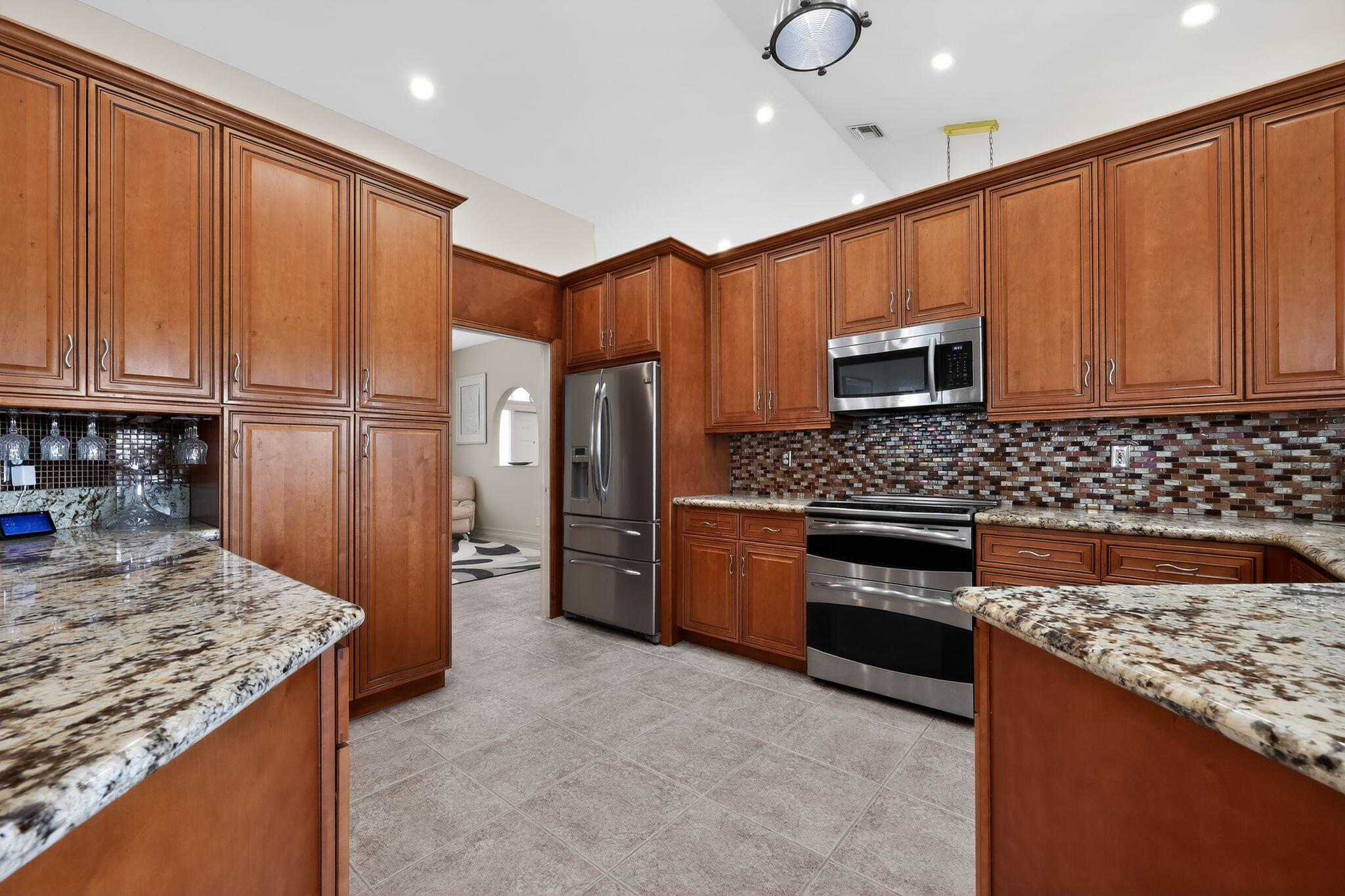 12301 Cabot Court Boca Raton, FL 33428 - Photo 10 of 30 17_12301_Cabot_Ct_Boca_Raton_FL_33428_US