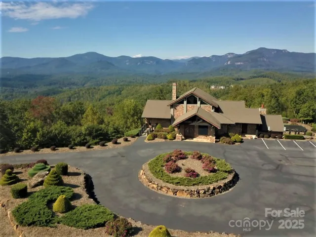 an aerial view of a house with a garden