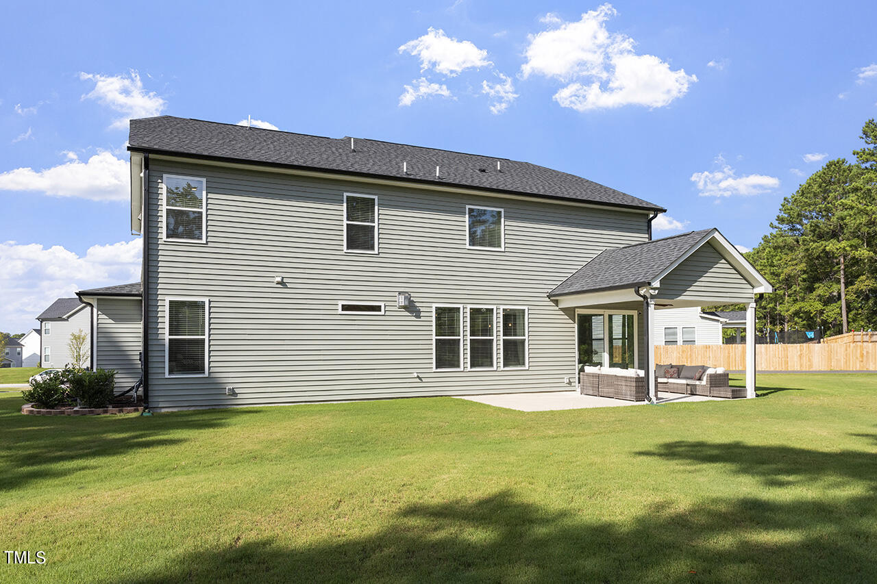 131 Hopper Circle Clayton, NC 27520 - Photo 37 of 39 a view of a house with a yard