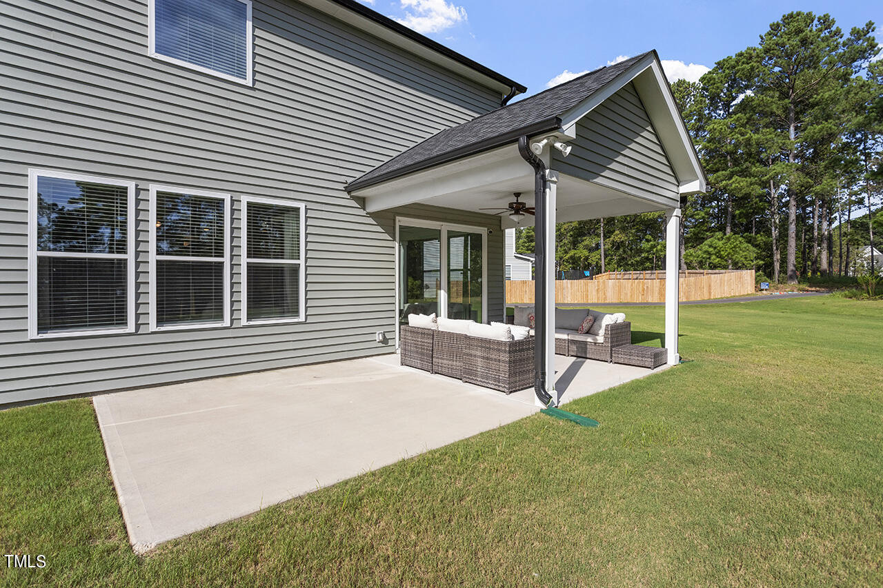 131 Hopper Circle Clayton, NC 27520 - Photo 7 of 39 a view of a house with backyard and porch