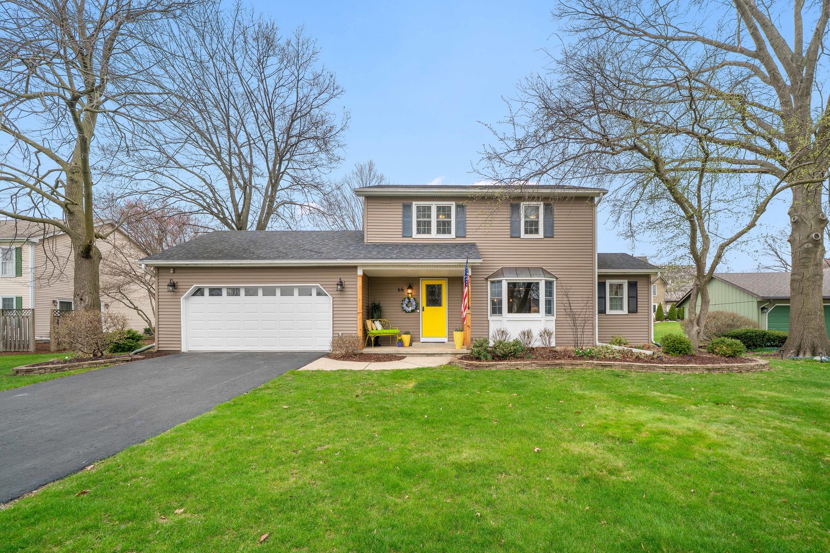 66 Winthrop New Road Sugar Grove, IL 60554 - Photo 1 of 39 a front view of house with yard and green space
