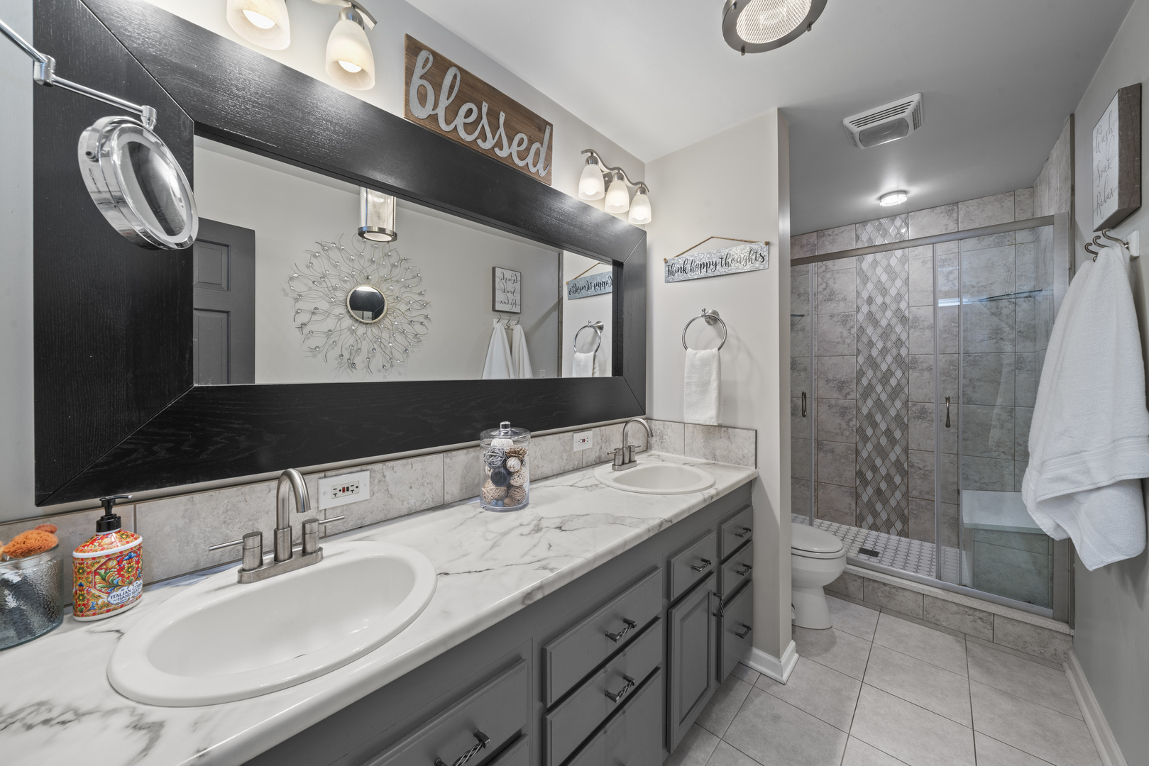 66 Winthrop New Road Sugar Grove, IL 60554 - Photo 18 of 39 a bathroom with a sink double vanity and a mirror