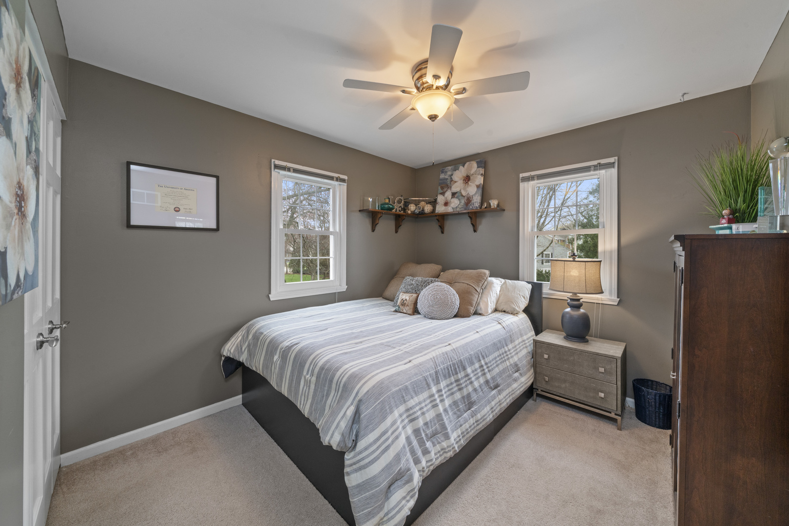 66 Winthrop New Road Sugar Grove, IL 60554 - Photo 19 of 39 a bedroom with a bed and a chandelier