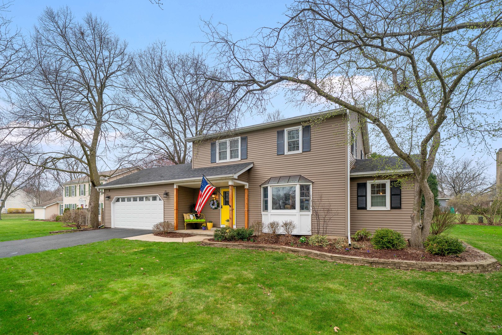 66 Winthrop New Road Sugar Grove, IL 60554 - Photo 2 of 39 front view of a house with a yard