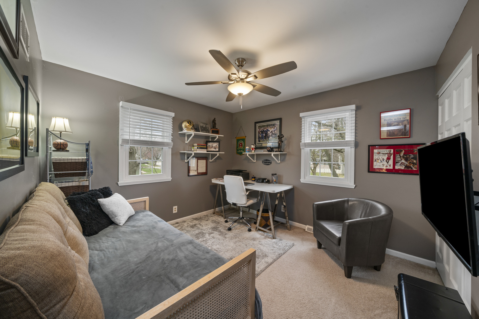 66 Winthrop New Road Sugar Grove, IL 60554 - Photo 21 of 39 a living room with furniture a ceiling fan and a window
