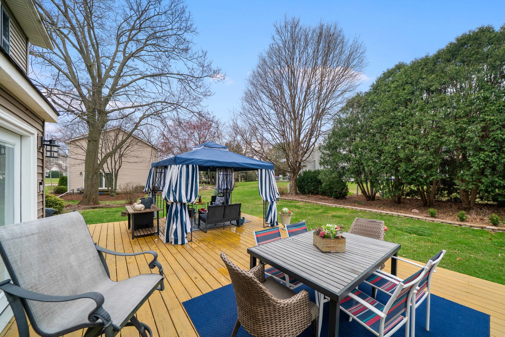 66 Winthrop New Road Sugar Grove, IL 60554 - Photo 29 of 39 a view of a patio with furniture and a yard