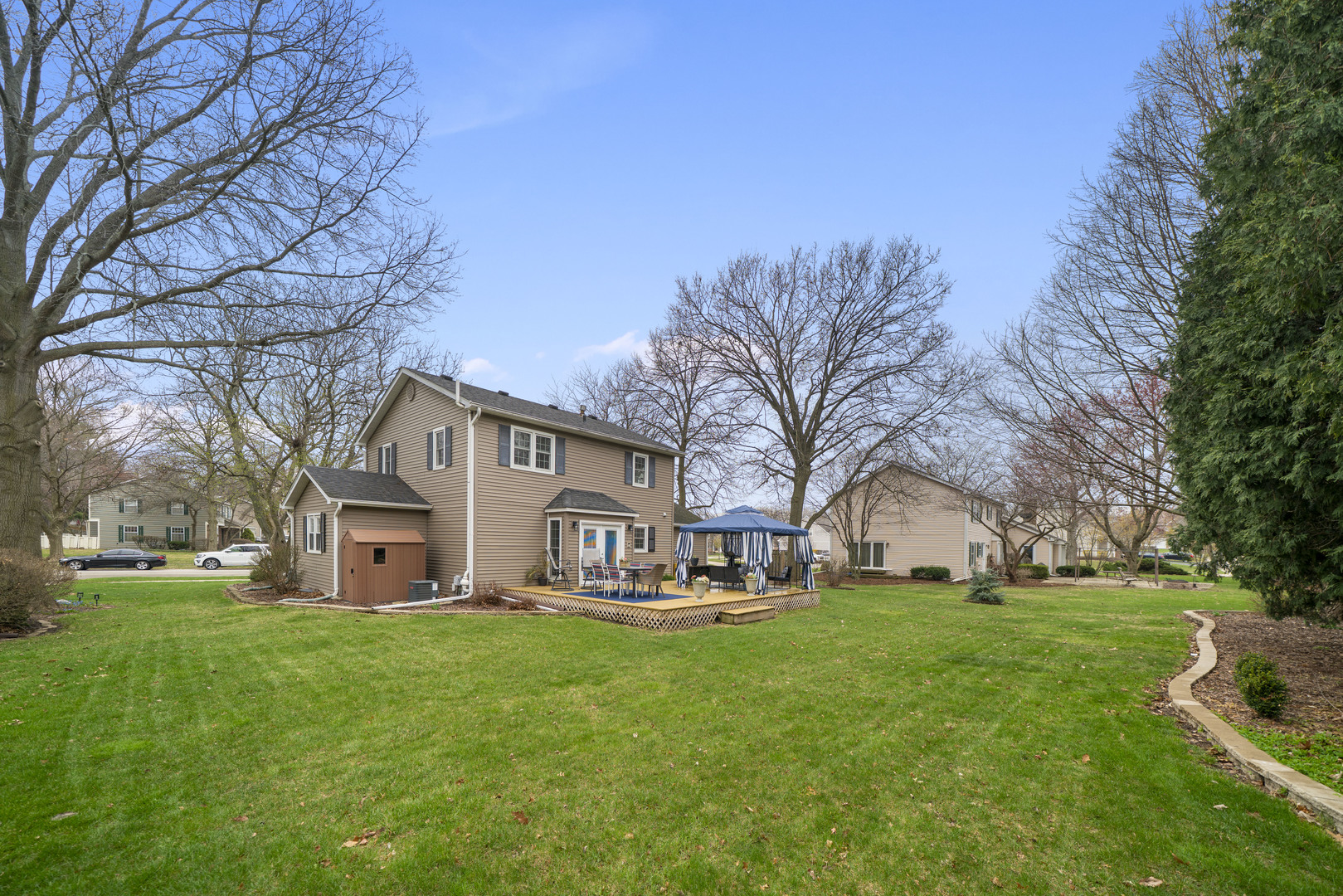 66 Winthrop New Road Sugar Grove, IL 60554 - Photo 32 of 39 a front view of house with yard and green space