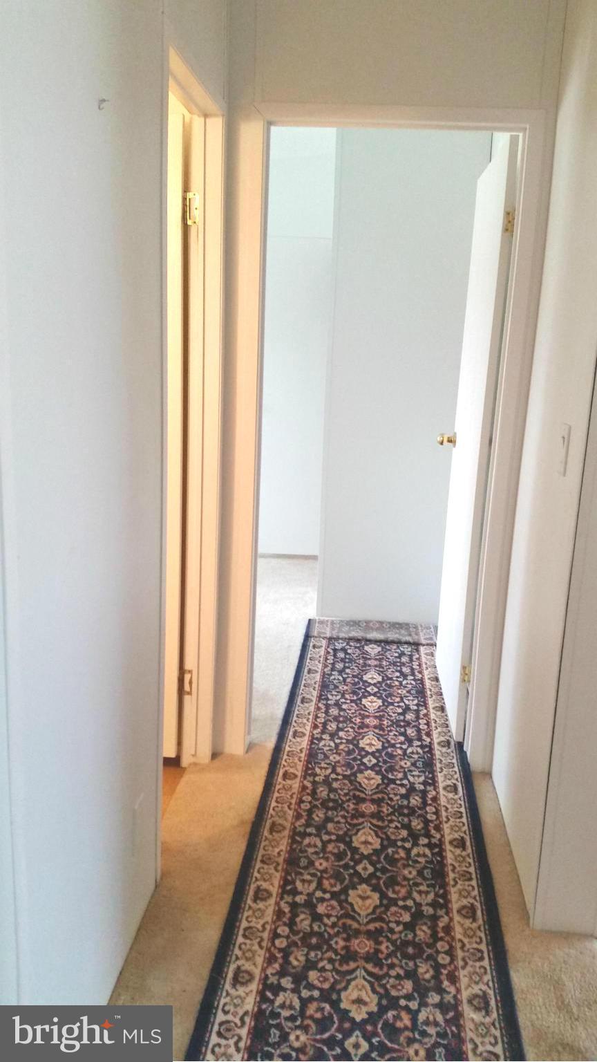 9387 Dulaney Road Rixeyville, VA 22737 - Photo 16 of 27 Hallway with 3 bedrooms and bath