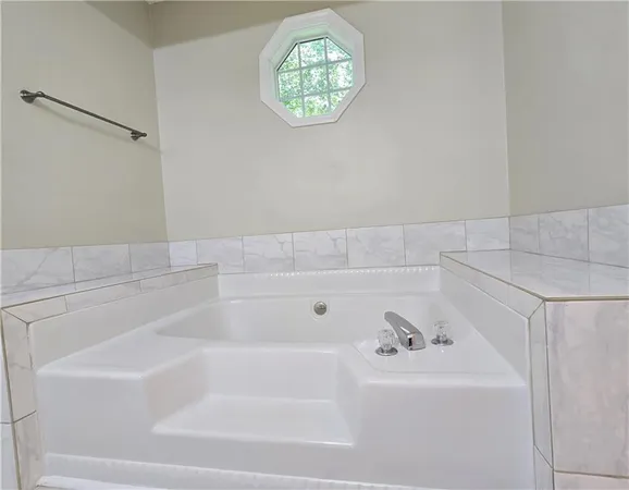 a bathroom with a bathtub