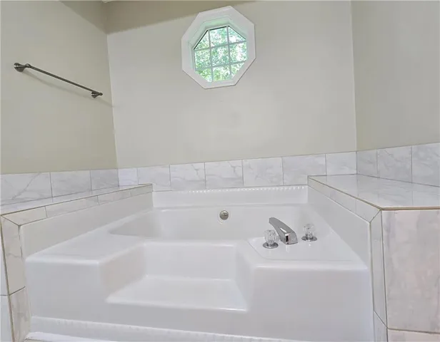 a bathroom with a bathtub