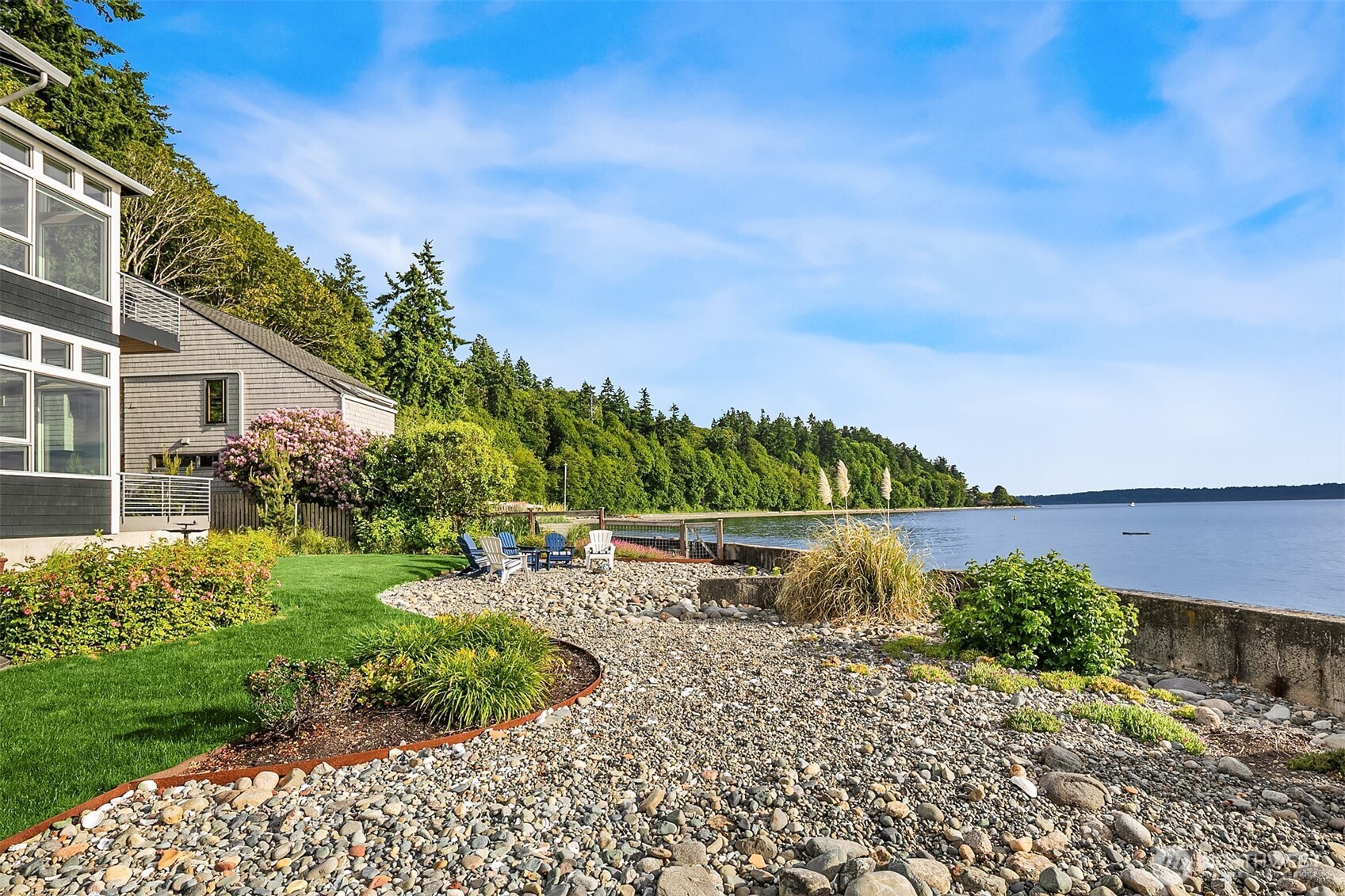 7161 Beach Drive Southwest Seattle, WA 98136 - Photo 29 of 40 a view of a garden with a building in the background