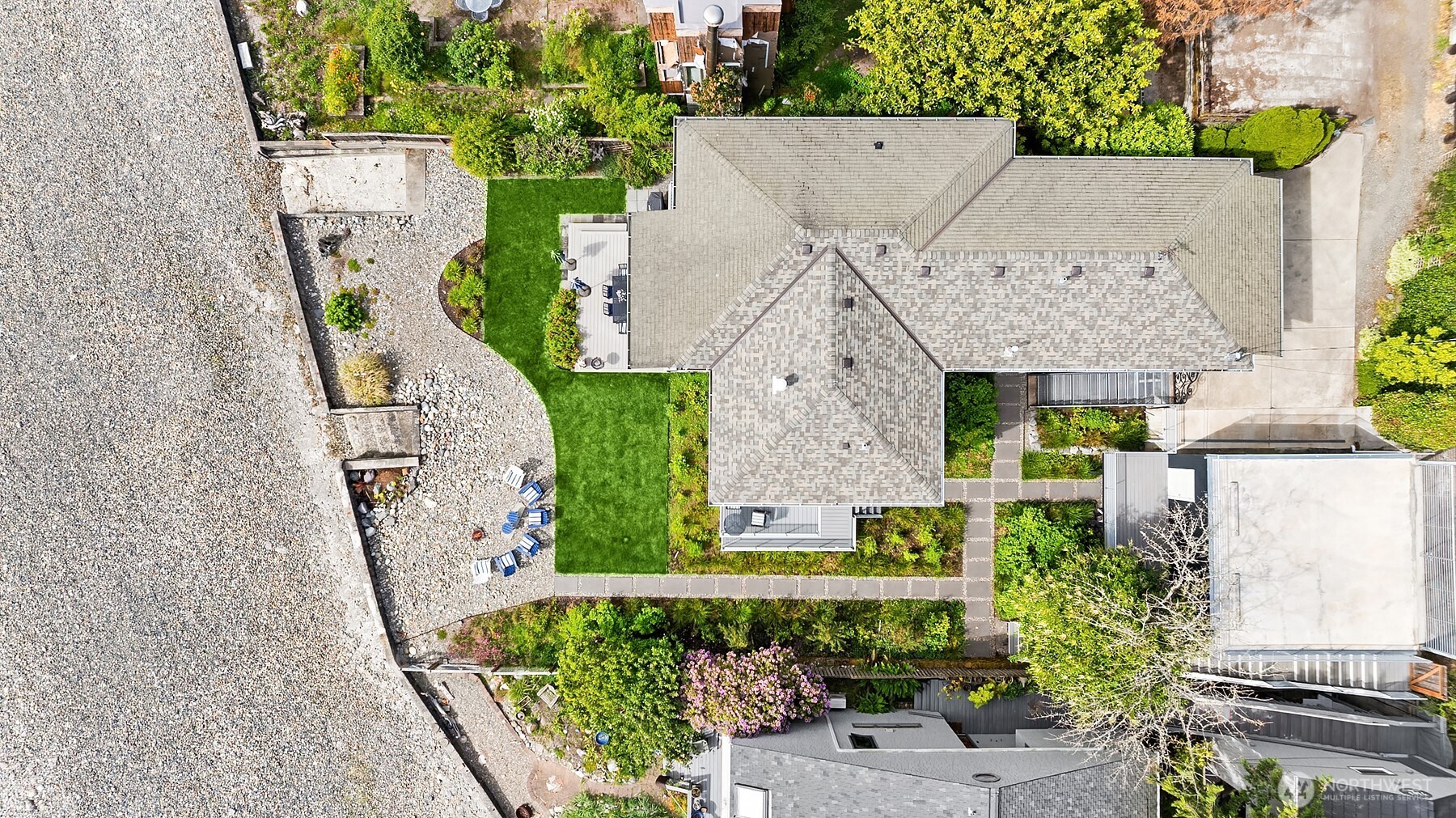 7161 Beach Drive Southwest Seattle, WA 98136 - Photo 35 of 40 an aerial view of a house with a yard and large tree