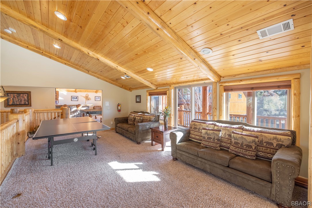 42324 Eagle Ridge Big Bear Lake, CA 92315 - Photo 23 of 50 a living room with furniture and a large window