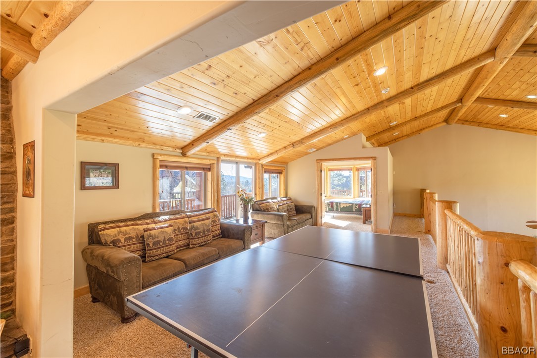 42324 Eagle Ridge Big Bear Lake, CA 92315 - Photo 24 of 50 a view of a living room and dining room
