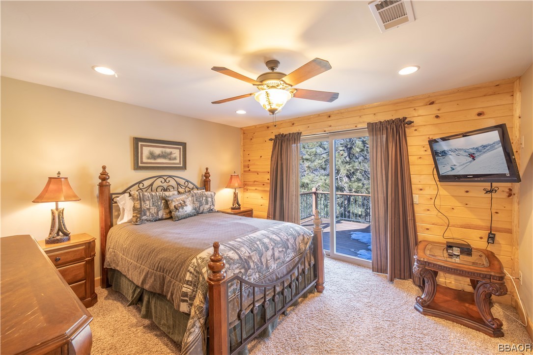 42324 Eagle Ridge Big Bear Lake, CA 92315 - Photo 41 of 50 a bedroom with a bed and a view of bedroom