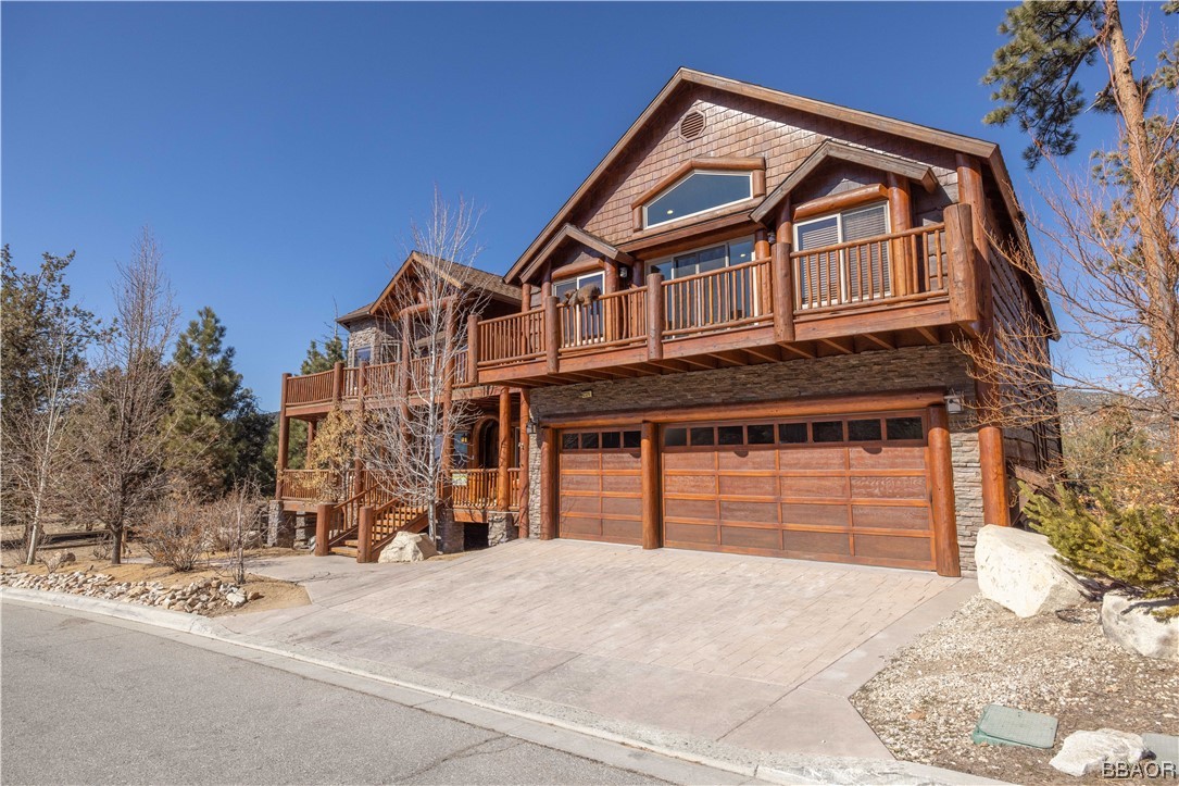42324 Eagle Ridge Big Bear Lake, CA 92315 - Photo 49 of 50 a front view of a house with a yard