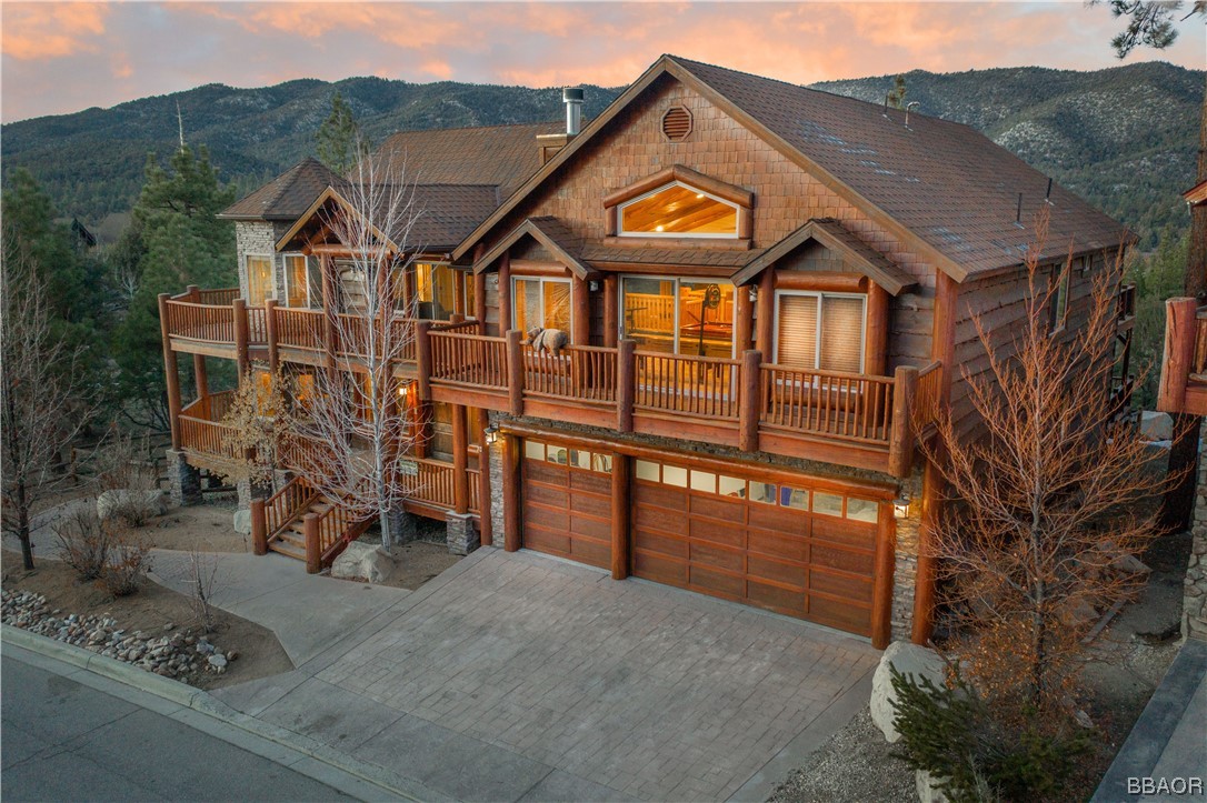 42324 Eagle Ridge Big Bear Lake, CA 92315 - Photo 8 of 50 a front view of a house with a yard
