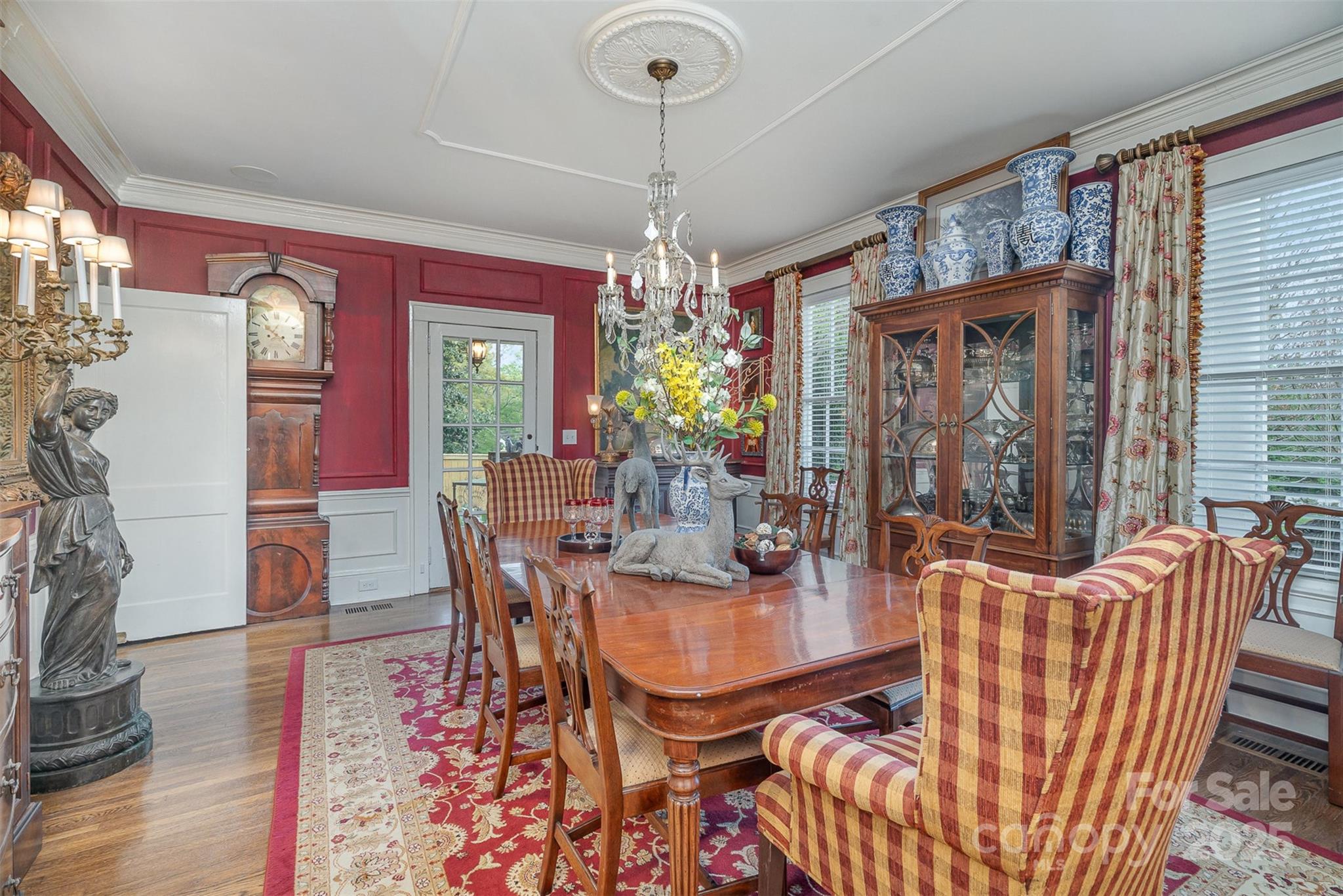 1313 South York Road Gastonia, NC 28052 - Photo 13 of 45 a view of a dining room with furniture window and wooden floor