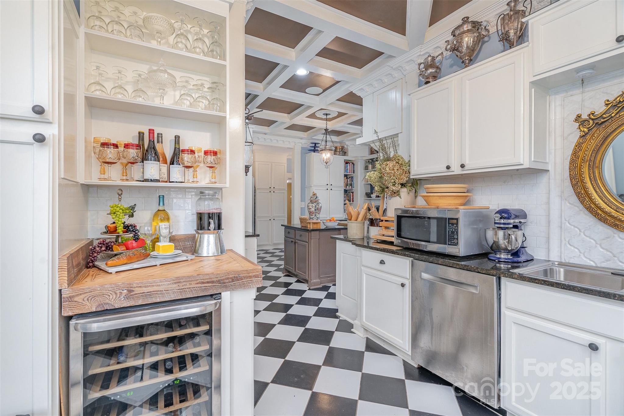 1313 South York Road Gastonia, NC 28052 - Photo 15 of 45 a kitchen with stainless steel appliances a stove a sink and a refrigerator
