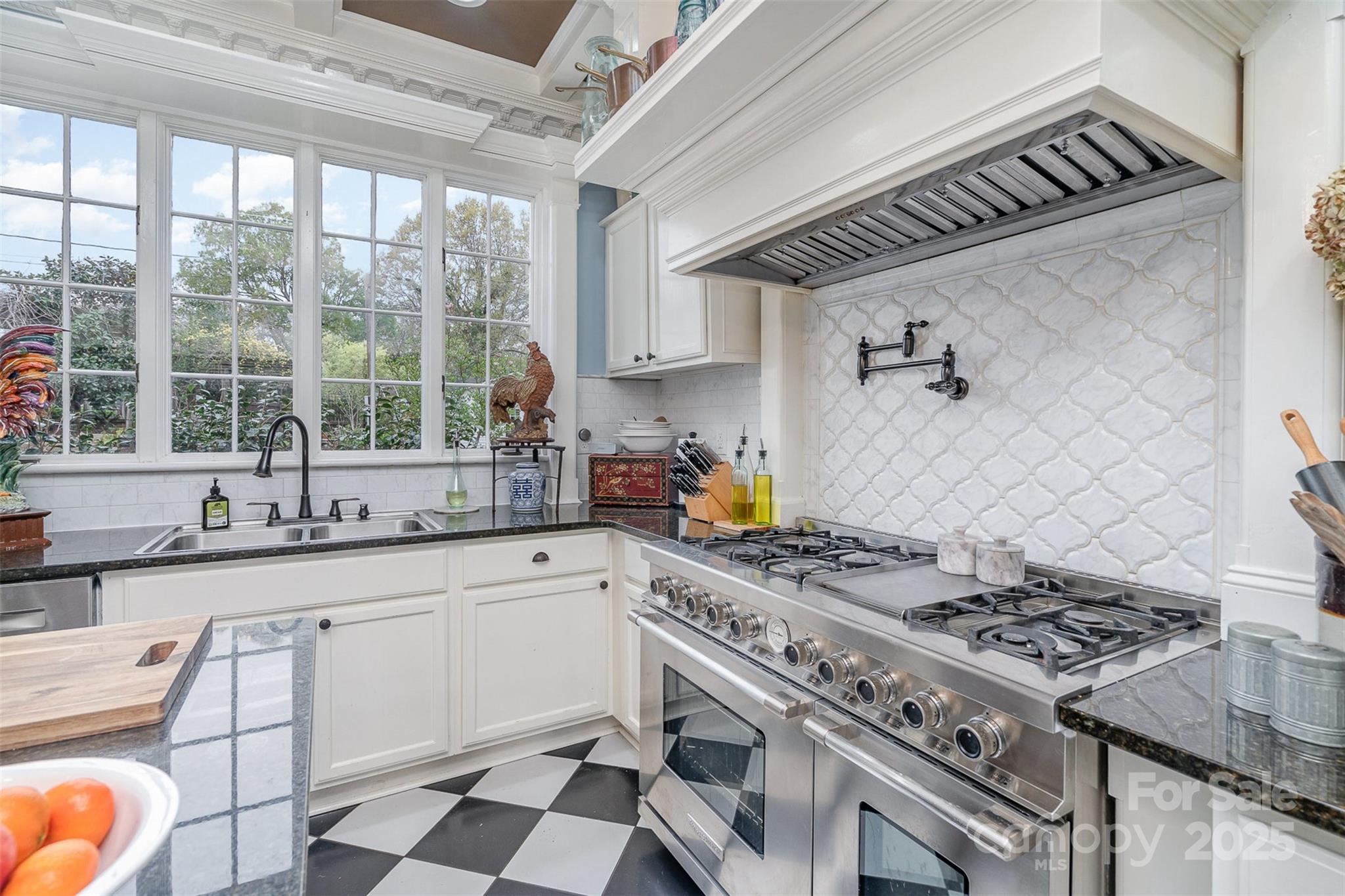 1313 South York Road Gastonia, NC 28052 - Photo 18 of 45 a kitchen that has a stove and a sink